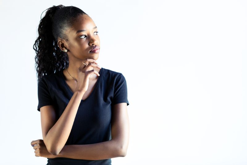 young woman thinking deeply